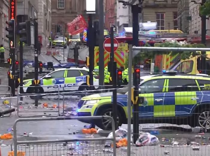 Celebration Turns to Chaos as Car Plows Into Crowd at Liverpool Victory Parade Injuring Dozens