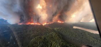 Wildfires Rage Across Canada Forcing Historic Evacuations as Smoke Blankets US Cities