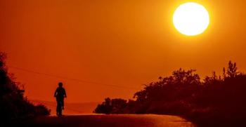 Houston Reaches 100 Degrees as Tropical Rain Threat Looms