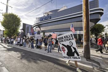 Elon Musk’s Tesla Diner Draws Long Lines and Loud Protests in West Hollywood