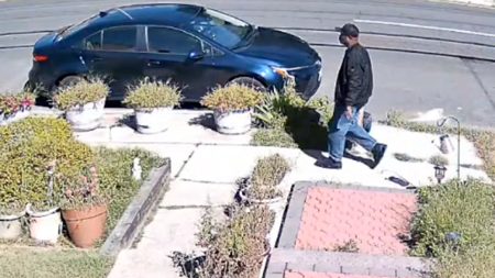 Queens suspect held after elderly couple slain in fire