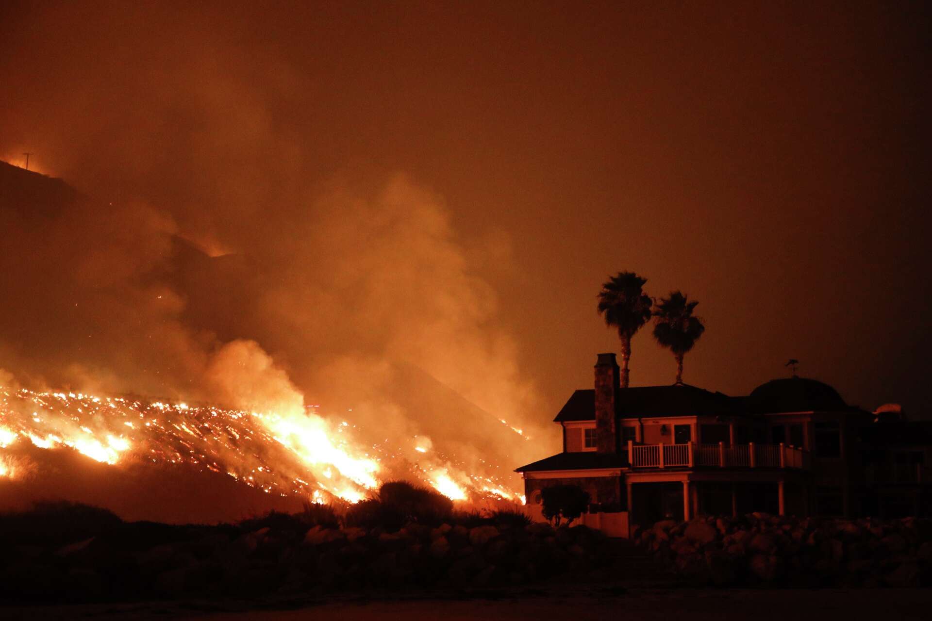 Springs and Crown Fires Prompt Evacuations Amid Powerful Santa Ana Winds in Southern California