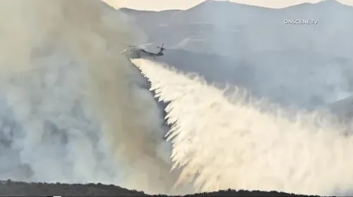 Wildfire Prompts Evacuations in Lake Elsinore as Firefighters Battle Vista Fire