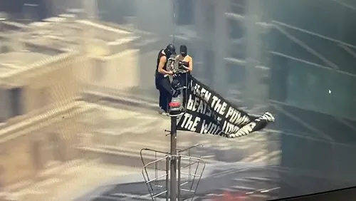 Couple Detained After Climbing Empire State Building with Proposal Banner